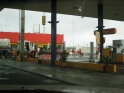 This gas station was full-service, and had tons of people on orange suits running around